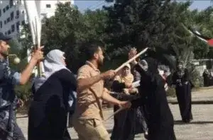 Hamas_beating_women